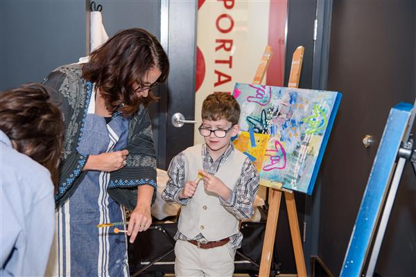 Mary Emily Galysh and Gerry Russell painting.
